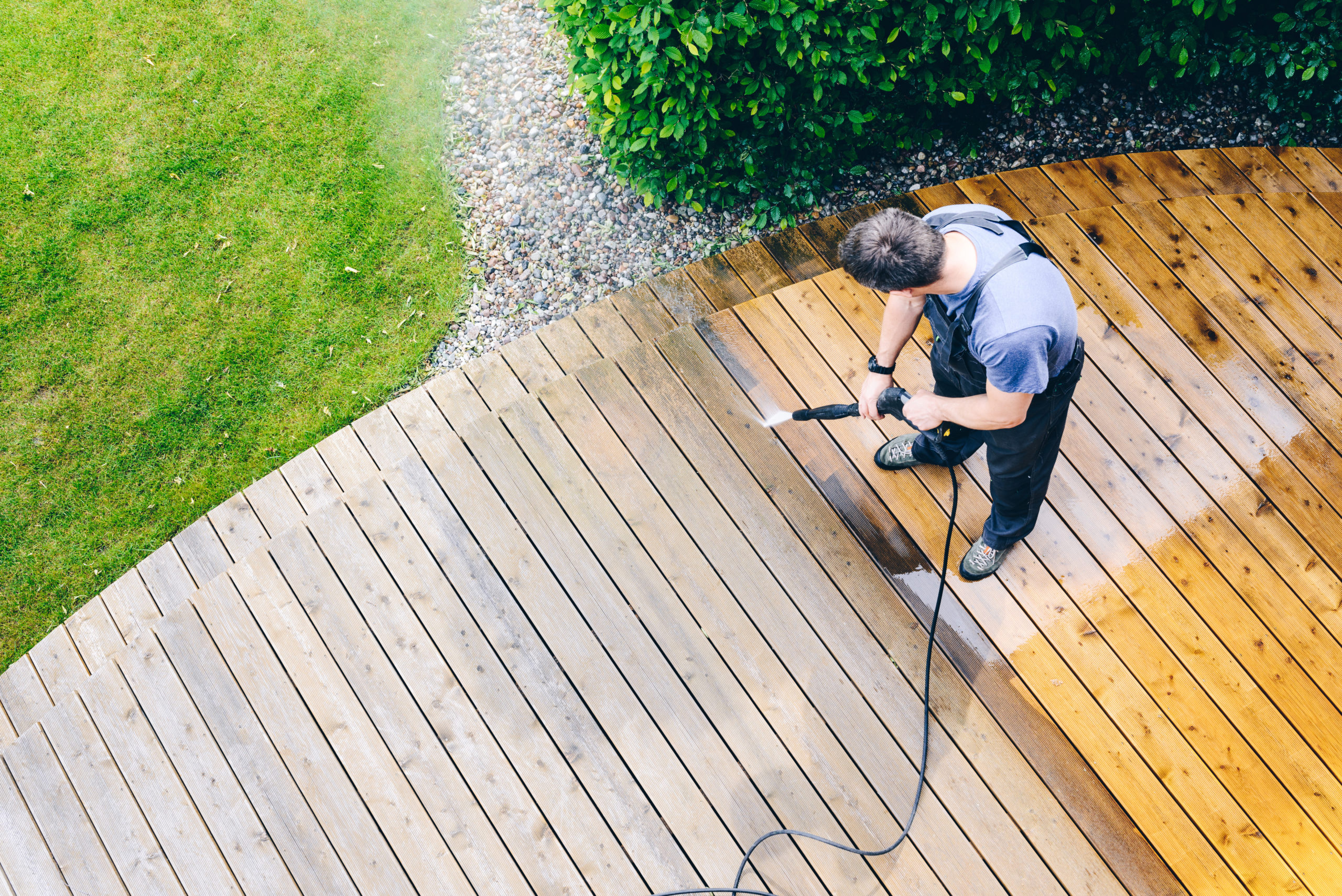 pressure washing backyard deck